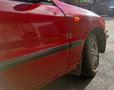 Червоний Деу Ланос, об'ємом двигуна 1.5 л та пробігом 268 тис. км за 1950 $, фото 25 на Automoto.ua