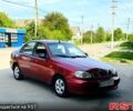 Красный Дэу Ланос, объемом двигателя 1.5 л и пробегом 190 тыс. км за 1450 $, фото 1 на Automoto.ua
