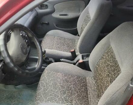 Червоний Деу Ланос, об'ємом двигуна 1.5 л та пробігом 224 тис. км за 1400 $, фото 8 на Automoto.ua
