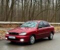 Красный Дэу Ланос, объемом двигателя 1.6 л и пробегом 235 тыс. км за 2150 $, фото 2 на Automoto.ua