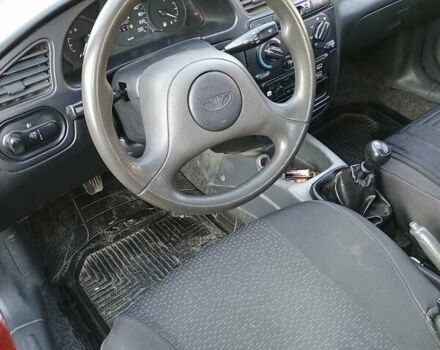 Красный Дэу Ланос, объемом двигателя 1.5 л и пробегом 157 тыс. км за 2750 $, фото 5 на Automoto.ua