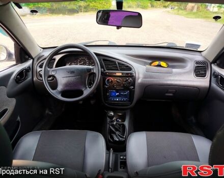Красный Дэу Ланос, объемом двигателя 1.6 л и пробегом 188 тыс. км за 2350 $, фото 9 на Automoto.ua