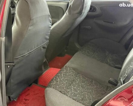 Красный Дэу Ланос, объемом двигателя 1.5 л и пробегом 305 тыс. км за 2440 $, фото 9 на Automoto.ua