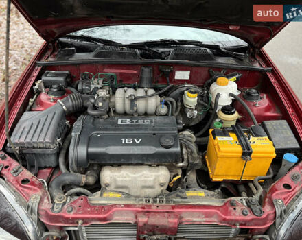 Красный Дэу Ланос, объемом двигателя 1.6 л и пробегом 235 тыс. км за 2150 $, фото 14 на Automoto.ua