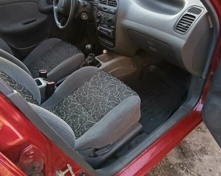 Красный Дэу Ланос, объемом двигателя 1.5 л и пробегом 103 тыс. км за 3000 $, фото 5 на Automoto.ua