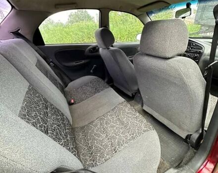 Красный Дэу Ланос, объемом двигателя 1.5 л и пробегом 150 тыс. км за 1250 $, фото 12 на Automoto.ua