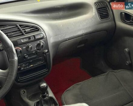 Червоний Деу Ланос, об'ємом двигуна 1.5 л та пробігом 305 тис. км за 2440 $, фото 14 на Automoto.ua