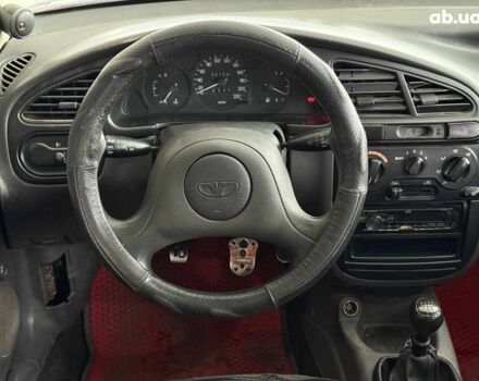 Красный Дэу Ланос, объемом двигателя 1.5 л и пробегом 305 тыс. км за 2440 $, фото 13 на Automoto.ua