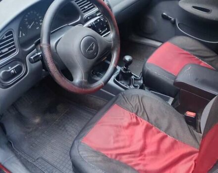 Красный Дэу Ланос, объемом двигателя 1.5 л и пробегом 120 тыс. км за 2900 $, фото 8 на Automoto.ua