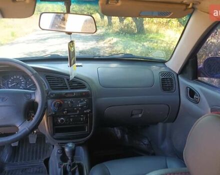 Красный Дэу Ланос, объемом двигателя 1.5 л и пробегом 150 тыс. км за 2650 $, фото 10 на Automoto.ua