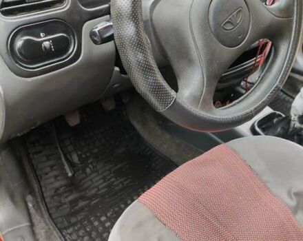 Красный Дэу Ланос, объемом двигателя 1.5 л и пробегом 275 тыс. км за 1700 $, фото 5 на Automoto.ua