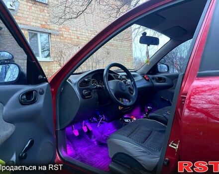 Червоний Деу Ланос, об'ємом двигуна 1.5 л та пробігом 193 тис. км за 2600 $, фото 6 на Automoto.ua