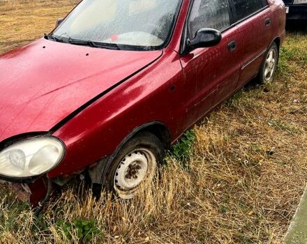 Красный Дэу Ланос, объемом двигателя 1.5 л и пробегом 200 тыс. км за 900 $, фото 3 на Automoto.ua