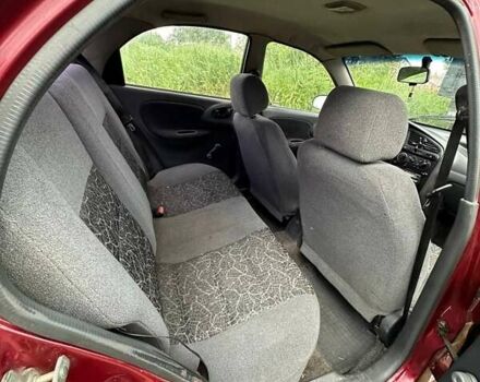 Красный Дэу Ланос, объемом двигателя 1.5 л и пробегом 150 тыс. км за 1250 $, фото 13 на Automoto.ua