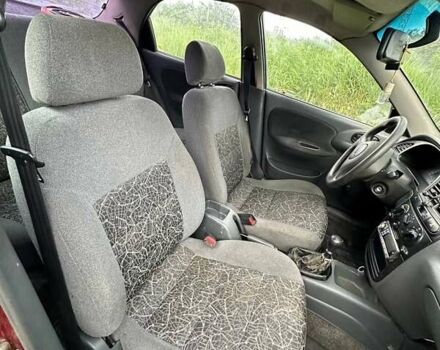 Красный Дэу Ланос, объемом двигателя 1.5 л и пробегом 150 тыс. км за 1250 $, фото 18 на Automoto.ua