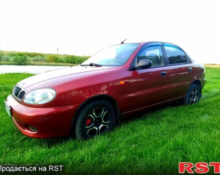 Красный Дэу Ланос, объемом двигателя 1.6 л и пробегом 188 тыс. км за 2350 $, фото 1 на Automoto.ua