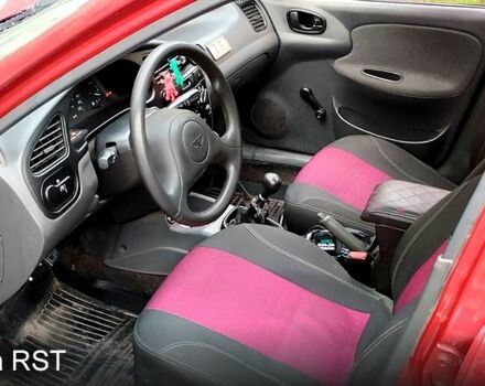 Красный Дэу Ланос, объемом двигателя 1.5 л и пробегом 185 тыс. км за 1400 $, фото 4 на Automoto.ua