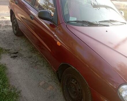 Красный Дэу Ланос, объемом двигателя 1.5 л и пробегом 260 тыс. км за 2637 $, фото 2 на Automoto.ua