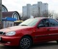 Красный Дэу Ланос, объемом двигателя 1.6 л и пробегом 143 тыс. км за 1400 $, фото 1 на Automoto.ua