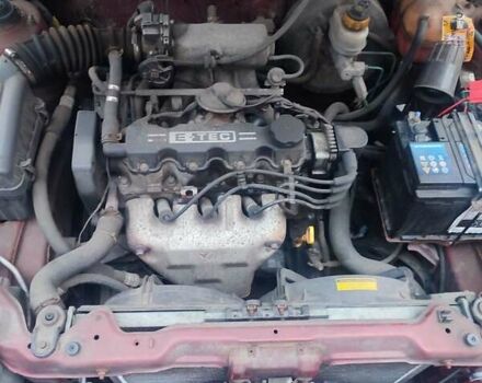 Красный Дэу Ланос, объемом двигателя 1.5 л и пробегом 120 тыс. км за 2900 $, фото 10 на Automoto.ua