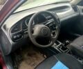 Красный Дэу Ланос, объемом двигателя 1.5 л и пробегом 100 тыс. км за 1180 $, фото 1 на Automoto.ua