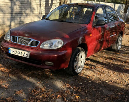 Красный Дэу Ланос, объемом двигателя 1.5 л и пробегом 195 тыс. км за 2200 $, фото 3 на Automoto.ua