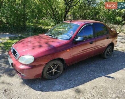 Красный Дэу Ланос, объемом двигателя 1.5 л и пробегом 311 тыс. км за 1800 $, фото 1 на Automoto.ua