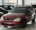 Красный Дэу Ланос, объемом двигателя 1.5 л и пробегом 305 тыс. км за 2440 $, фото 1 на Automoto.ua
