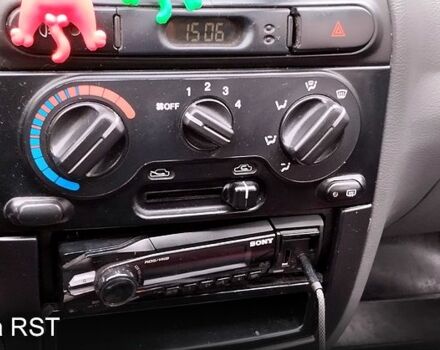 Красный Дэу Ланос, объемом двигателя 1.5 л и пробегом 185 тыс. км за 1400 $, фото 2 на Automoto.ua