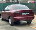 Красный Дэу Ланос, объемом двигателя 1.5 л и пробегом 270 тыс. км за 1400 $, фото 3 на Automoto.ua