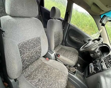 Красный Дэу Ланос, объемом двигателя 1.5 л и пробегом 150 тыс. км за 1250 $, фото 14 на Automoto.ua