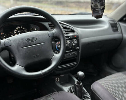 Красный Дэу Ланос, объемом двигателя 1.6 л и пробегом 235 тыс. км за 2150 $, фото 8 на Automoto.ua