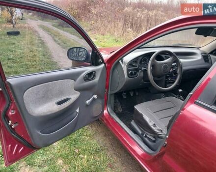 Красный Дэу Ланос, объемом двигателя 1.5 л и пробегом 289 тыс. км за 1700 $, фото 9 на Automoto.ua