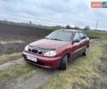 Красный Дэу Ланос, объемом двигателя 1.5 л и пробегом 163 тыс. км за 2200 $, фото 1 на Automoto.ua