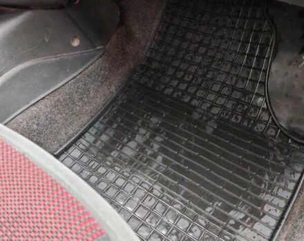 Красный Дэу Ланос, объемом двигателя 1.5 л и пробегом 275 тыс. км за 1700 $, фото 6 на Automoto.ua