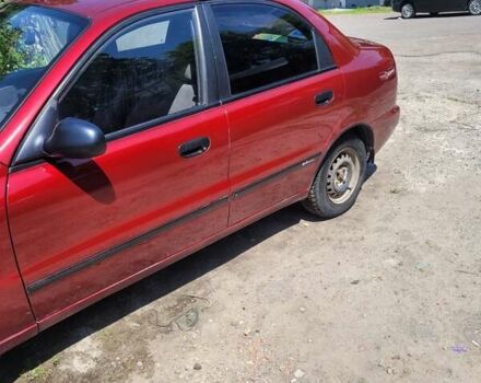 Червоний Деу Ланос, об'ємом двигуна 1.5 л та пробігом 145 тис. км за 1850 $, фото 1 на Automoto.ua