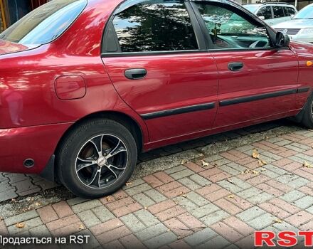 Красный Дэу Ланос, объемом двигателя 1.5 л и пробегом 230 тыс. км за 2300 $, фото 4 на Automoto.ua
