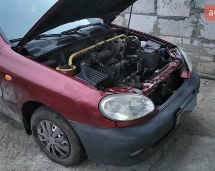 Красный Дэу Ланос, объемом двигателя 1.5 л и пробегом 305 тыс. км за 1800 $, фото 7 на Automoto.ua