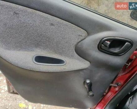 Красный Дэу Ланос, объемом двигателя 1.5 л и пробегом 275 тыс. км за 1700 $, фото 13 на Automoto.ua