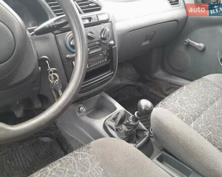 Красный Дэу Ланос, объемом двигателя 1.5 л и пробегом 163 тыс. км за 2200 $, фото 7 на Automoto.ua