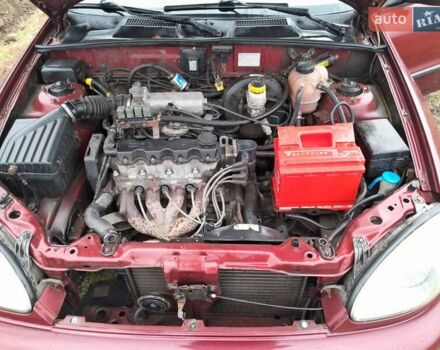 Красный Дэу Ланос, объемом двигателя 1.5 л и пробегом 163 тыс. км за 2200 $, фото 5 на Automoto.ua