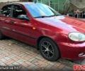 Красный Дэу Ланос, объемом двигателя 1.5 л и пробегом 230 тыс. км за 2300 $, фото 1 на Automoto.ua