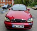 Красный Дэу Ланос, объемом двигателя 1.5 л и пробегом 200 тыс. км за 1800 $, фото 1 на Automoto.ua