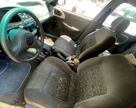 Красный Дэу Ланос, объемом двигателя 1.5 л и пробегом 0 тыс. км за 1000 $, фото 7 на Automoto.ua