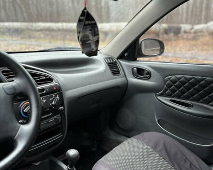 Красный Дэу Ланос, объемом двигателя 1.6 л и пробегом 235 тыс. км за 2150 $, фото 13 на Automoto.ua