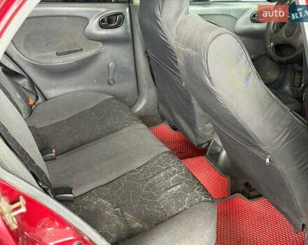 Червоний Деу Ланос, об'ємом двигуна 1.5 л та пробігом 305 тис. км за 2440 $, фото 12 на Automoto.ua