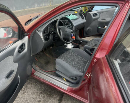 Деу Ланос 2007 у Черкасах на Automoto.ua Червоний Деу Ланос, об'ємом двигуна 1.6 л та пробігом 311 тис. км за 2575 $, фото 9 на Automoto.ua