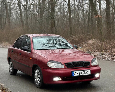 Красный Дэу Ланос, объемом двигателя 1.6 л и пробегом 235 тыс. км за 2150 $, фото 2 на Automoto.ua