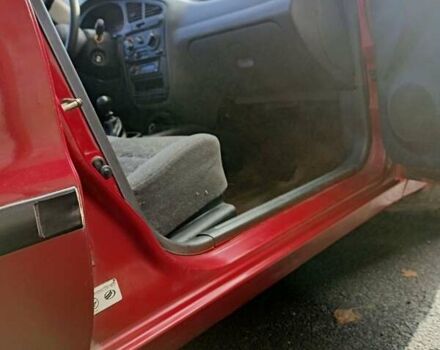 Червоний Деу Ланос, об'ємом двигуна 1.5 л та пробігом 268 тис. км за 1950 $, фото 19 на Automoto.ua