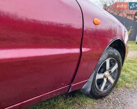 Красный Дэу Ланос, объемом двигателя 1.5 л и пробегом 289 тыс. км за 1700 $, фото 2 на Automoto.ua